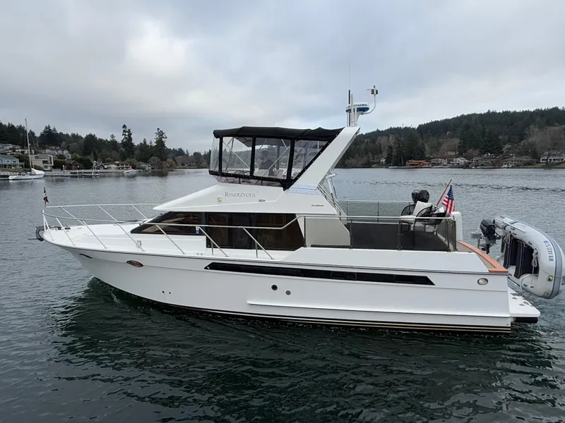 Slide: The Image of 1988 Ocean Alexander 42 CPMY yacht on a serene lake. - 49