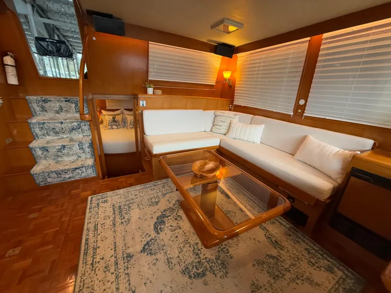 Slide: The Image of Luxurious interior of 1988 Ocean Alexander 42 CPMY yacht with elegant seating and decor. - 6