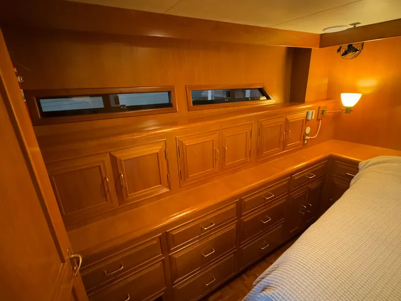 Slide: The Image of Luxurious wood-paneled cabin interior of 1988 Ocean Alexander 42 CPMY yacht. - 7