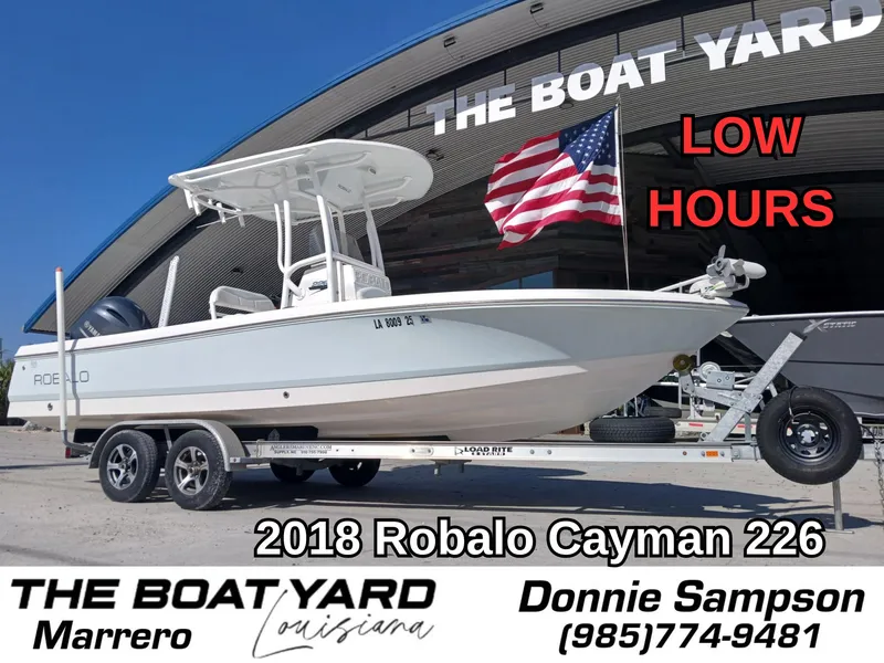 Slide: The Image of 2018 Robalo 226 Cayman boat on trailer at The Boat Yard, Marrero, Louisiana. - 1