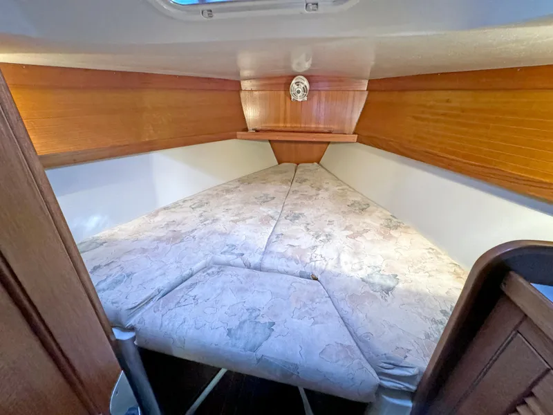 Slide: The Image of Interior cabin of 2000 Catalina 36 MkII sailboat with cozy V-berth. - 11