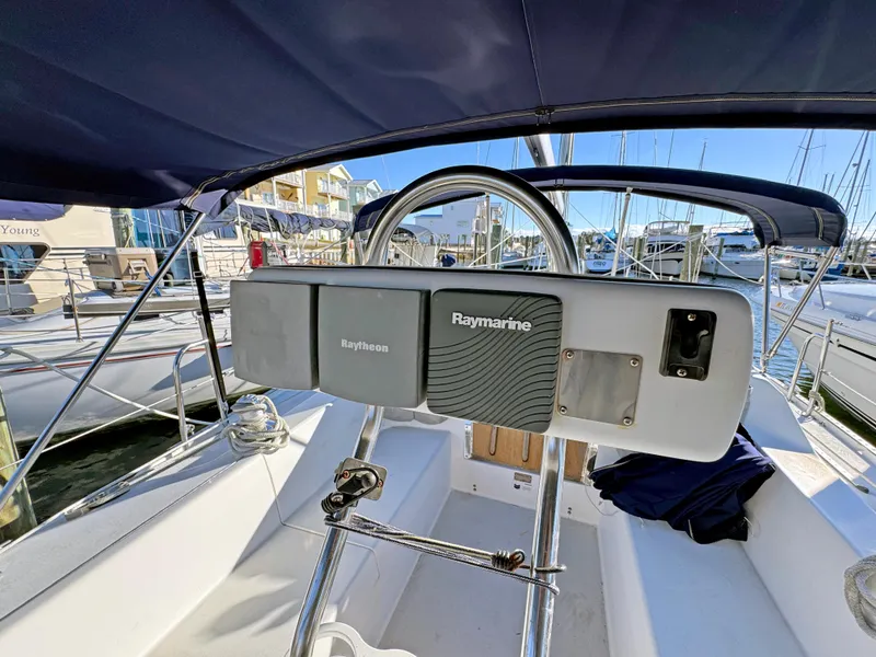 Slide: The Image of Catalina 36 MkII 2000 sailboat cockpit with Raymarine navigation equipment at marina. - 20
