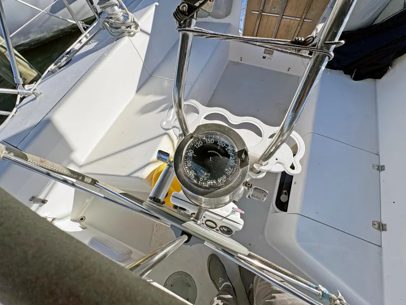 Slide: The Image of Cockpit of 2000 Catalina 36 MkII sailboat with compass and steering wheel. - 21