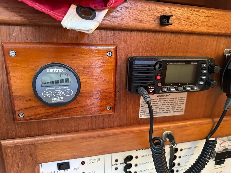 Slide: The Image of Control panel of a 2000 Catalina 36 MkII sailboat with Xantrex monitor and radio. - 7