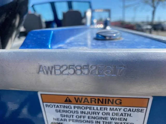 Slide: The Image of 2017 Alumaweld Intruder boat with visible hull identification number and safety warning label. - 20