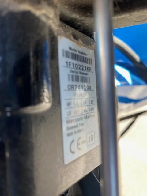 Slide: The Image of Close-up of a Mercury Marine engine label on a 2017 Alumaweld Intruder boat. - 21