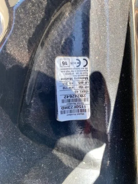 Slide: The Image of Sticker on 2017 Alumaweld Intruder boat, displaying Mercury Marine specifications and serial number. - 22