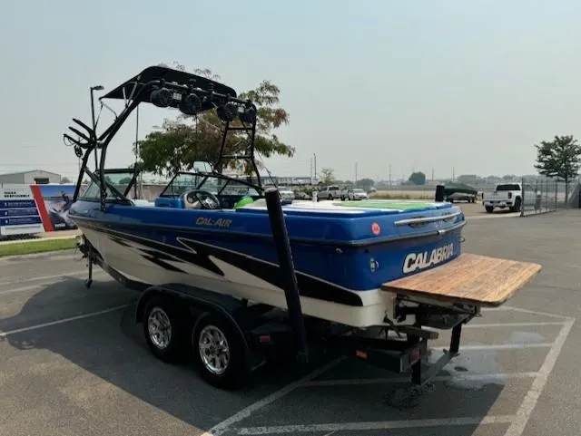 Slide: The Image of 2005 Calabria Cal Air Pro-V boat on trailer in parking lot. - 5