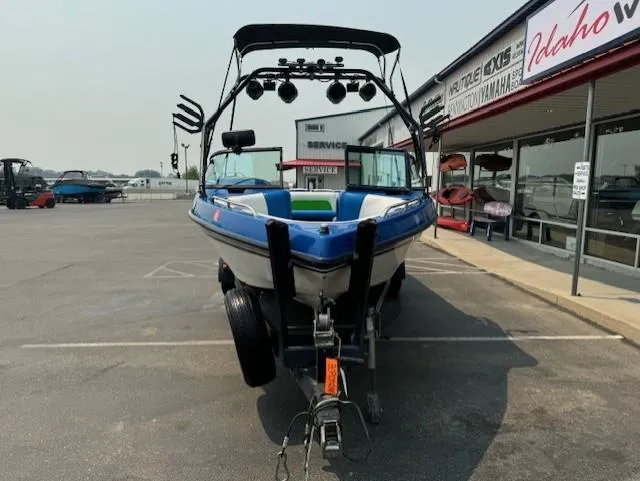 Slide: The Image of 2005 Calabria Cal Air Pro-V boat on trailer in parking lot. - 8