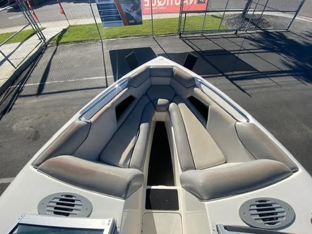 Slide: The Image of 2006 Centurion Air Warrior Elite C-4 boat interior with cushioned seating and speakers. - 10