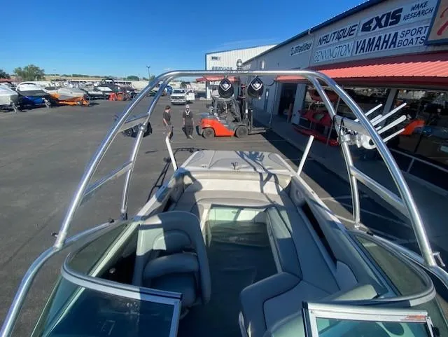 Slide: The Image of 2006 Centurion Air Warrior Elite C-4 boat with wakeboard tower at a dealership. - 11