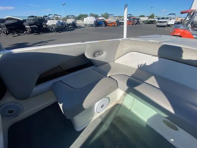 Slide: The Image of 2006 Centurion Air Warrior Elite C-4 boat interior with gray seating and speaker. - 16
