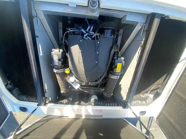 Slide: The Image of Engine compartment of a 2006 Centurion Air Warrior Elite C-4 boat. - 17