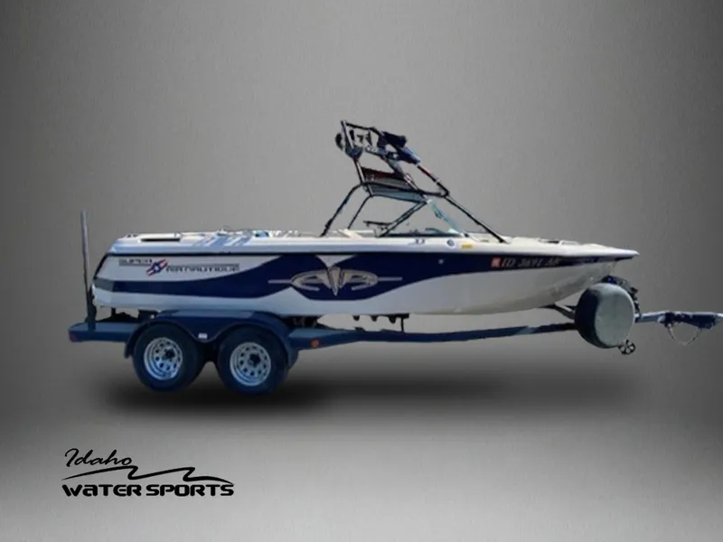Slide: The Image of 2001 Nautique Super Air Nautique 210 boat on trailer, Idaho Water Sports logo. - 1