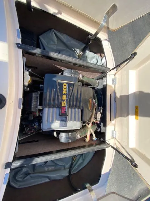 Slide: The Image of Engine compartment of 2001 Nautique Super Air Nautique 210 boat. - 18