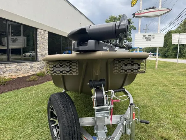 Slide: The Image of 2024 G3 16 FL boat displayed outdoors, featuring a trolling motor and swivel seat. - 3