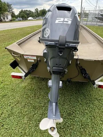 Slide: The Image of 2024 G3 16 FL boat with Yamaha outboard motor on grass. - 9