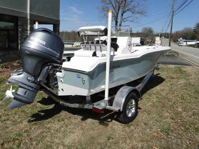 Slide: The Image of 2024 Tidewater 180 CC Adventure boat with Yamaha outboard motor on trailer. - 3