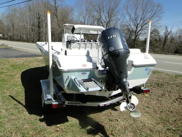 Slide: The Image of 2024 Tidewater 180 CC Adventure boat with outboard motor on a trailer. - 4