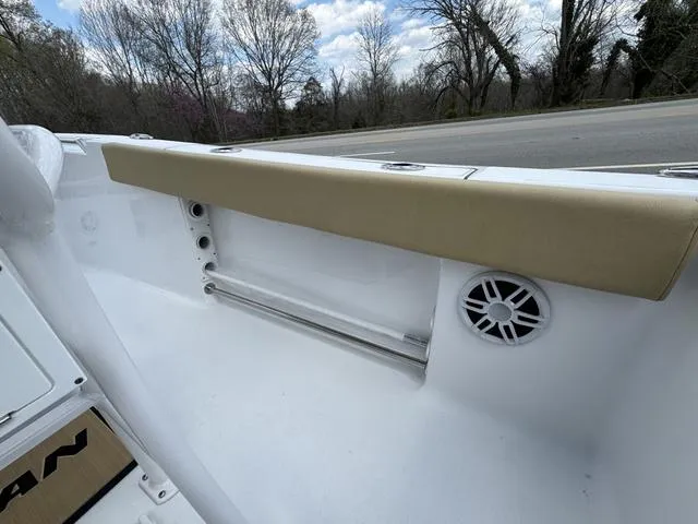 Slide: The Image of 2024 Sportsman Open 212 boat interior with speaker and cushioned rail. - 13