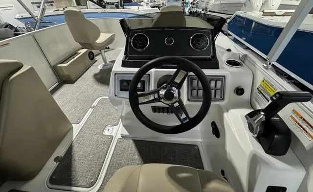 Slide: The Image of 2024 Hurricane FunDeck 1960 REF boat interior with steering wheel and seating. - 7