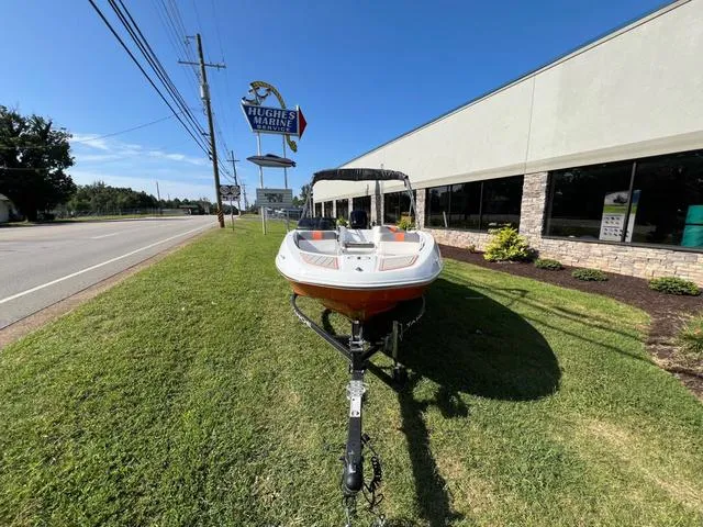 Slide: The Image of 2020 Tahoe T16 boat on trailer outside Hughes Marine dealership. - 3