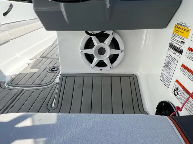 Slide: The Image of 2020 Tahoe T16 boat interior with speaker and non-slip flooring. - 8