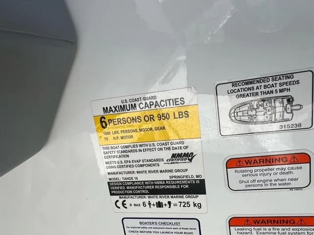 Slide: The Image of Capacity label on 2020 Tahoe T16 boat, max 6 persons or 950 lbs. - 9