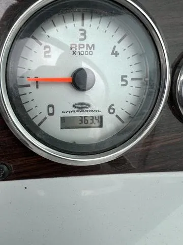Slide: The Image of Close-up of 2005 Chaparral Sunesta 236 RPM gauge showing 3634 hours. - 5