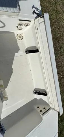 Slide: The Image of 2003 Sea Fox 180FF boat interior, showing seating and storage compartments. - 13