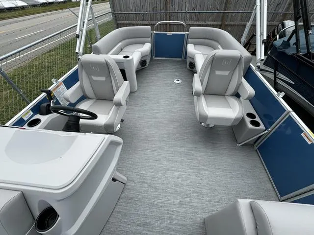 Slide: The Image of 2024 Godfrey Xperience 2286 SBX pontoon boat with spacious seating and modern design. - 4