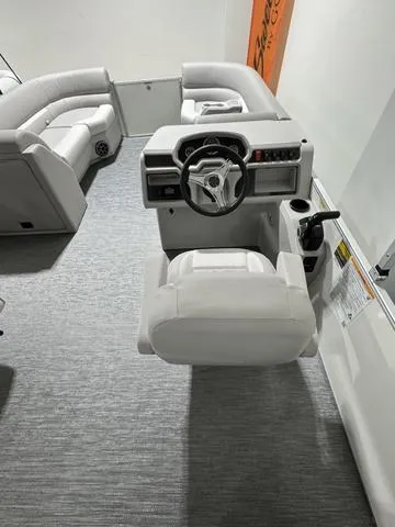 Slide: The Image of 2024 Godfrey Xperience 2286 SBX boat interior with modern helm and seating. - 7