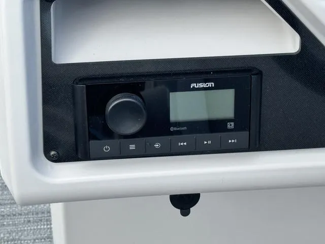 Slide: The Image of Fusion audio system on 2024 Godfrey Xperience 2286 SBX boat dashboard. - 10