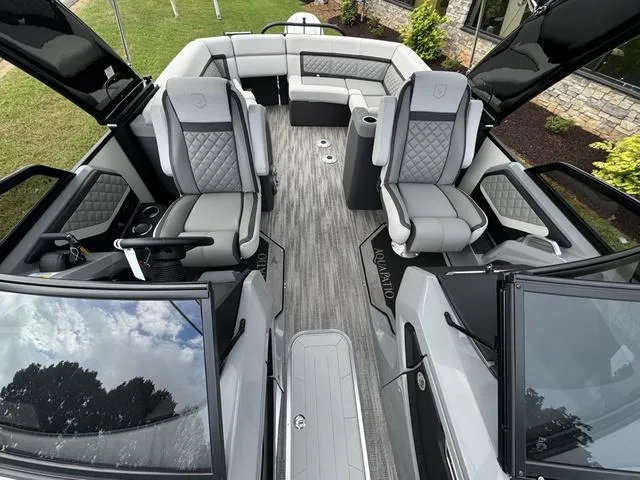 Slide: The Image of Luxurious 2025 Godfrey AP235 ULW boat interior with plush seating and modern design. - 11