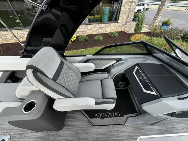 Slide: The Image of Luxury interior of 2025 Godfrey AP235 ULW boat with plush seating and modern design. - 17
