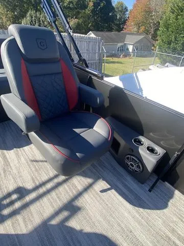 Slide: The Image of 2025 Godfrey SW2286 SFLC boat seat with cup holders and speaker. - 10