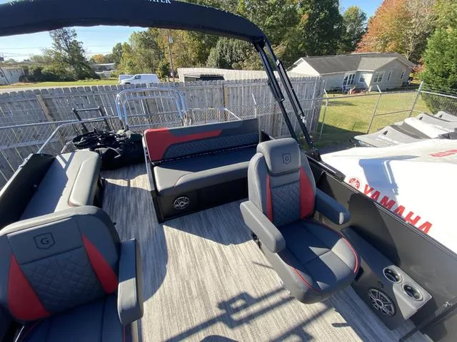 Slide: The Image of 2025 Godfrey SW2286 SFLC boat interior with modern seating and Yamaha equipment. - 5