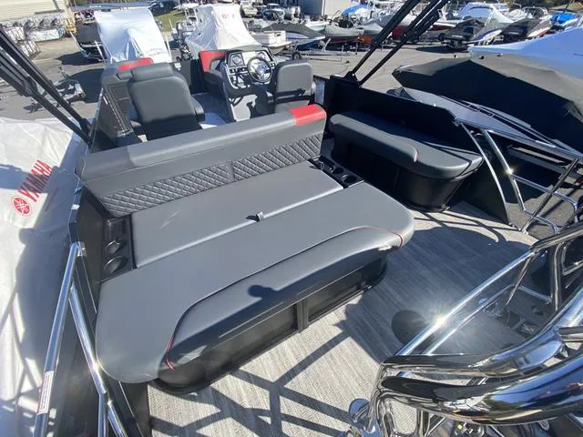 Slide: The Image of 2025 Godfrey SW2286 SFLC boat interior with sleek seating and modern design. - 7