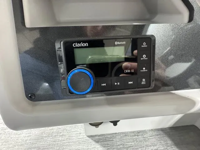 Slide: The Image of Clarion CMM-10 Bluetooth stereo system in 2025 Godfrey EX2286 SFLX boat. - 10