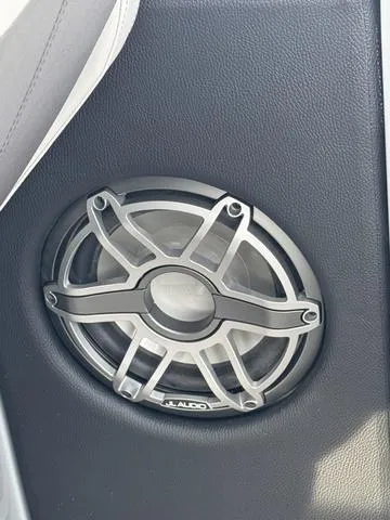 Slide: The Image of Close-up of a JL Audio speaker in a 2025 Godfrey MC255SFL boat. - 11