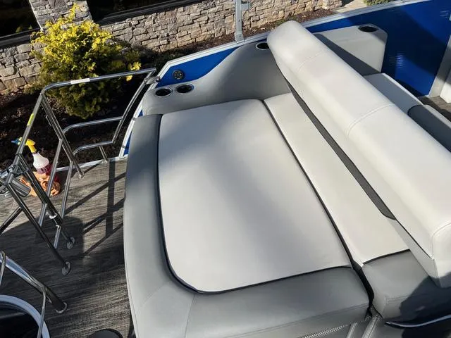 Slide: The Image of 2022 Godfrey Monaco 235 SFL boat with sleek seating and modern design. - 12