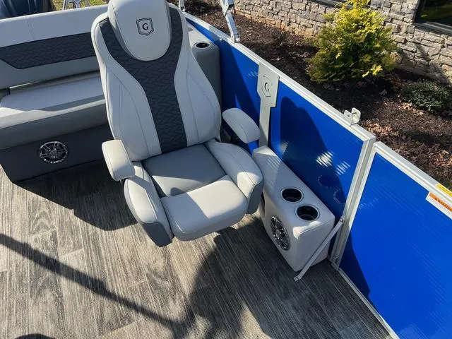 Slide: The Image of Luxurious seating on 2022 Godfrey Monaco 235 SFL pontoon boat with cup holders and speakers. - 22