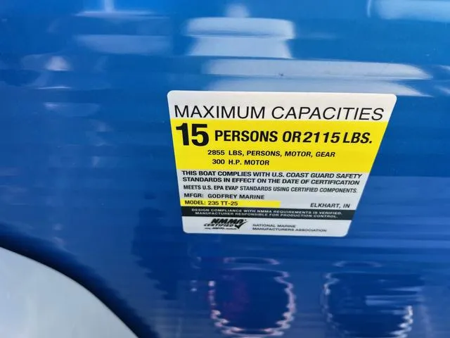 Slide: The Image of Capacity label on 2022 Godfrey Monaco 235 SFL boat, maximum 15 persons or 2115 lbs. - 4