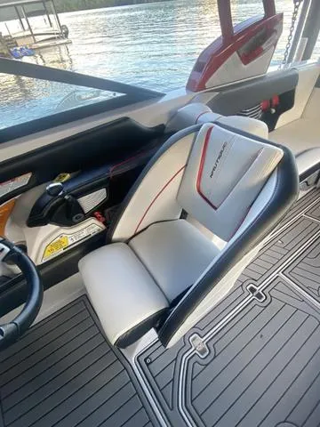 Slide: The Image of 2014 Nautique Super Air G23 interior with sleek seating and modern design. - 21