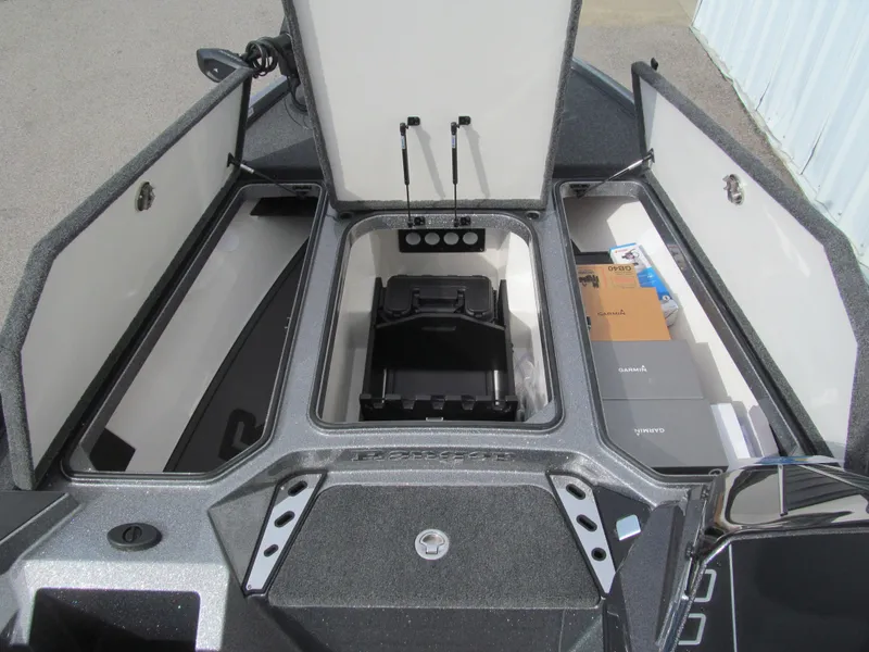 Slide: The Image of 2025 Ranger Z519R Cup-Equipped boat storage compartments open, showcasing organized interior space. - 8