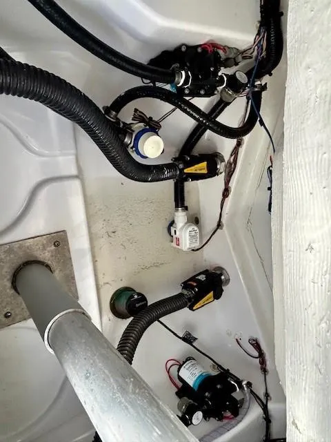 Slide: The Image of 2024 Sportsman Open 232 Center Console boat wiring and plumbing components. - 22