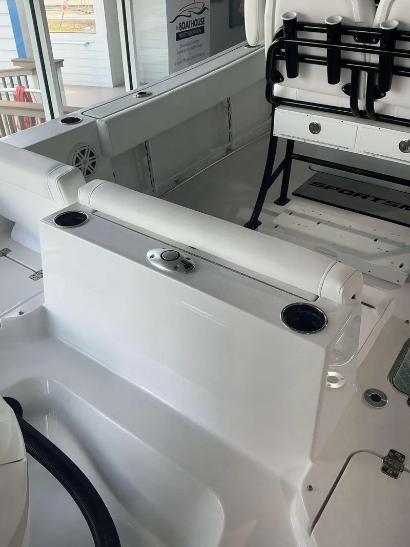 Slide: The Image of 2025 Sportsman 231 Heritage boat interior with seating and rod holders. - 9