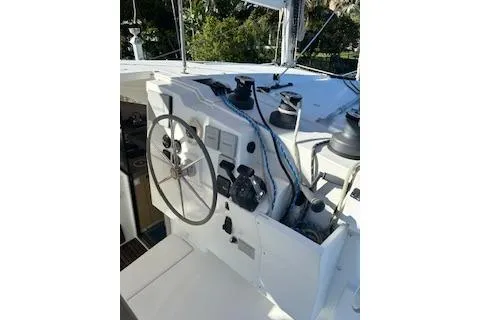 Slide: The Image of 2019 Fountaine Pajot Lucia 40 yacht helm with steering wheel and control panel. - 3