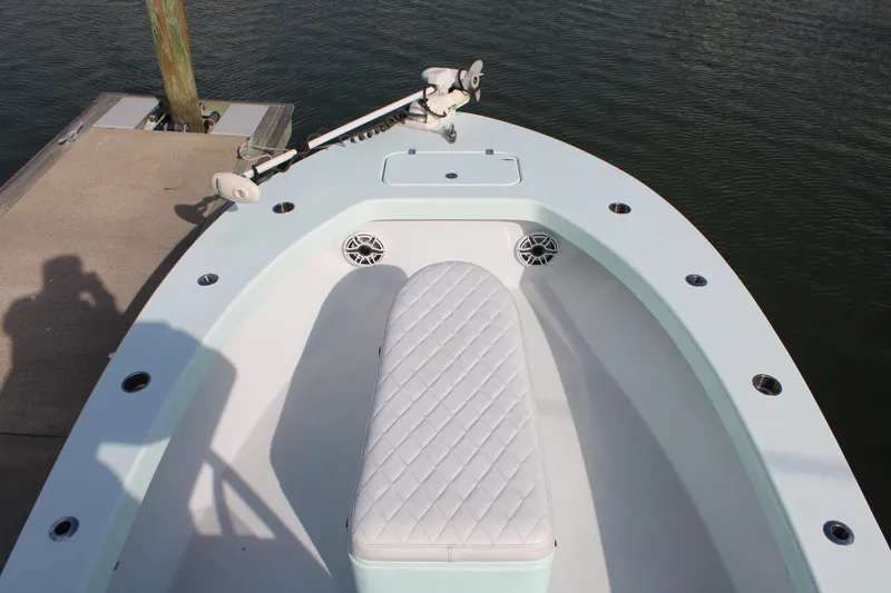 Slide: The Image of 2021 ZCB 26 Freemason boat bow with seating and trolling motor. - 1