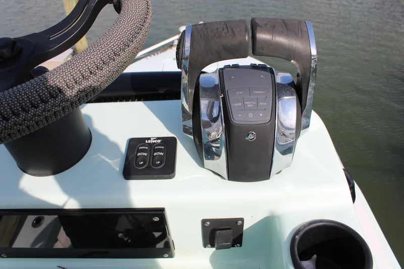 Slide: The Image of Boat control panel of 2021 ZCB 26 Freemason with steering wheel and throttle. - 11